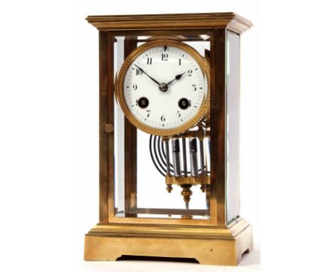 Late 19th century French lacquered band brass four-glass mantel clock^ the plinth shaped case with stepped pediment over four