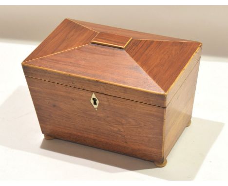 Rosewood simulated tea caddy^ sarcophagus top open interior fitted with two compartments^ 19cm wide