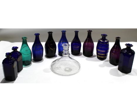 Group of Bristol Blue glass decanters with various names^ Brandy^ Hollands etc^ mainly blue glass^ one green glass^ and a fur