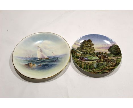 Royal Worcester plate decorated with sailing ships^ signed R Rushton^ factory puce mark to base^ together with a further Roya