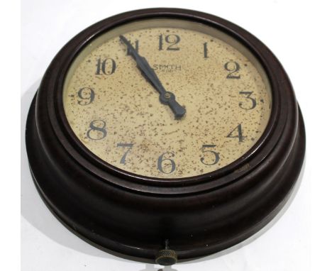 Bakelite cased circular Smiths 8-day wall clock^ the movement stamped with broad arrow^ chapter ring also marked verso with X