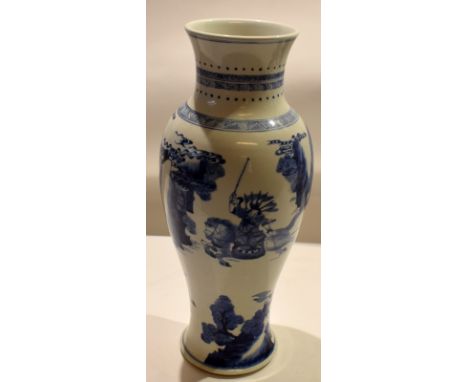 Large Chinese porcelain baluster vase^ after a Kangxi original^ decorated with a blue and white design with warriors and land