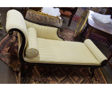 Simulated rosewood Regency sofa^ on sabre legs^ original castors and cut brass mounts