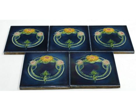 Group of late 19th century ceramic tiles with an Art Nouveau floral design^ 15cm diam (5)