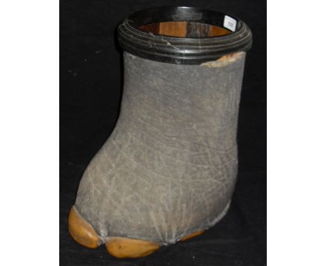 A Victorian elephant foot stick stand with moulded wooden rim