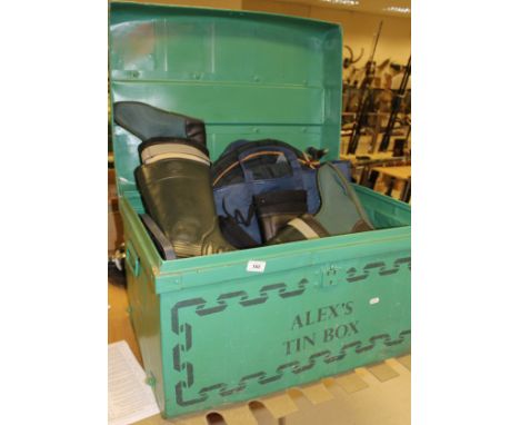 A tin trunk containing two pairs of Derri boots, landing nets, keep nets and miscellaneous fishing gear