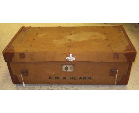 A canvas and leather trunk inscribed "A.M.A Hearn" to side