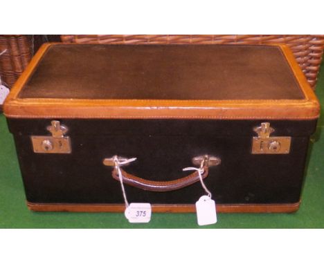 A leather bound picnic hamper opening to reveal a fitted interior, the china stamped "Adams"   CONDITION REPORTS  Approx 23.5