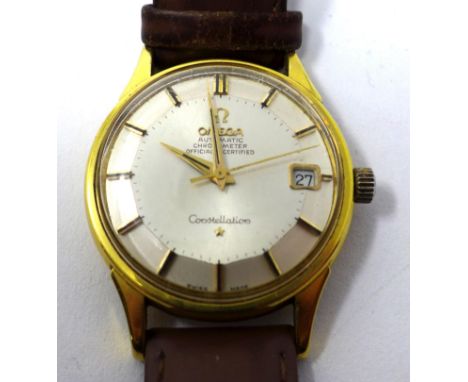 An Omega Constellation gold plated gentleman's automatic chronometer, silvered dial with baton markers and date aperture at 3