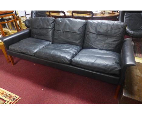 A 20th century Danish Hans Olsen style black leather sofa