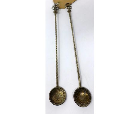 Two Middle Eastern 800 silver coin spoons, with twisted stems and crescent moon and star finial and crown finial, H.26cm (2 