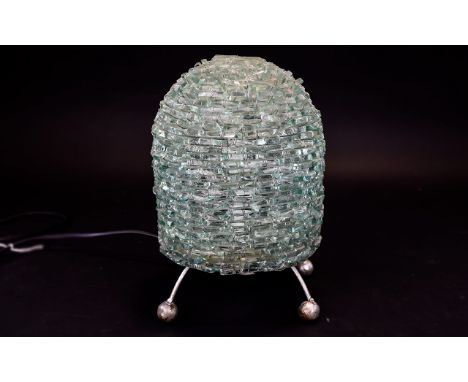 A 1960's/70's Art Glass Lamp Handmade lamp with pewter tone sputnik legs and ball feet. Fashioned from numerous shards of rec