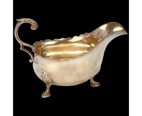 A George V silver sauce boat, Harrison Brothers & Howson, Sheffield 1930, 14.5cm, 4ozHandle pushed inwards, body has a few sm