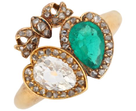 A late Victorian 18ct gold Colombian emerald and diamond twin heart ring, circa 1895, each heart centrally set with a 0.5ct p