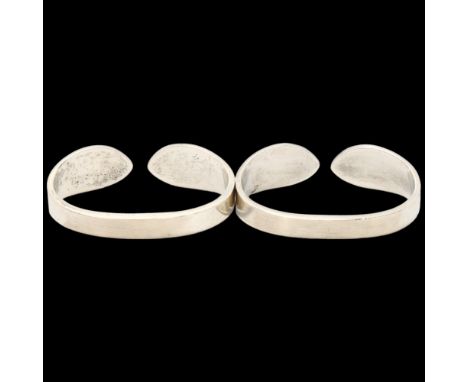 HANS HANSEN - a pair of Danish modernist sterling torque napkin rings, 5.5cm, 1.8oz totalNo damage or repair, only light surf