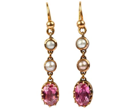 A pair of Edwardian pink tourmaline and pearl drop earrings, circa 1905, each earring set with 1ct oval mixed-cut tourmaline 