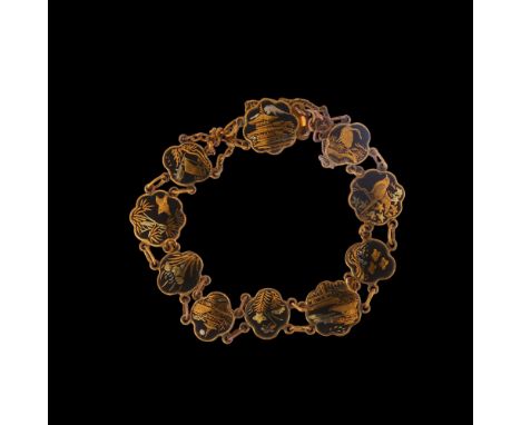 A Japanese Amita gold and silver Damascene inlaid panel bracelet, shaped panels depicting Mount Fuji birds and village scenes