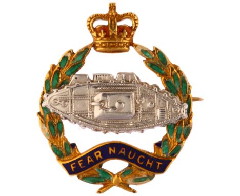 A mid-20th century 9ct yellow and white gold Fear Naught Tank Regiment brooch, maker JWB, Birmingham 1964, 24.1mm, 4.1gA few 