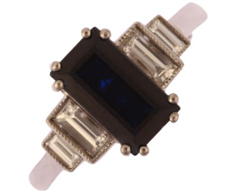 A platinum five stone sapphire and diamond ring, prong set with 1.6ct rectangular step-cut sapphire flanked by graduated beze