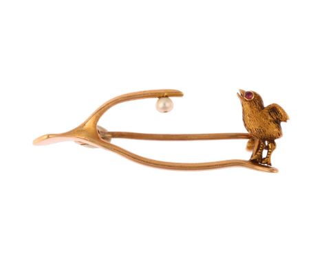 A Victorian ruby and pearl chick wishbone brooch, by Goldsmiths & Silversmiths Co Ltd, unmarked gold settings with realistica