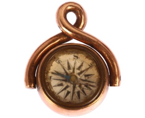 A 19th century rose gold plated compass/carnelian seal swivel spinner fob, panel diameter 12.8mm, 4.7gNo damage or repair, on