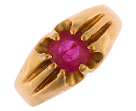 An 18ct gold flux-filled ruby gypsy ring, maker PT, London 1976, prong set with 0.9ct round-cut ruby, ruby weight calculated 