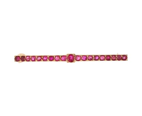 A Victorian ruby line bar brooch, unmarked gold settings, pave set with round-cut rubies, 51.8mm, 3.5gCentral stone possibly 