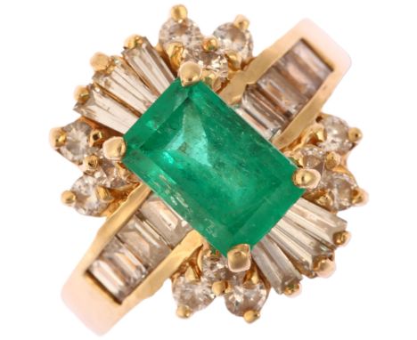 A 14ct gold emerald and diamond ballerina cluster ring, prong set with 1.38ct rectangular step-cut emerald surrounded by tape