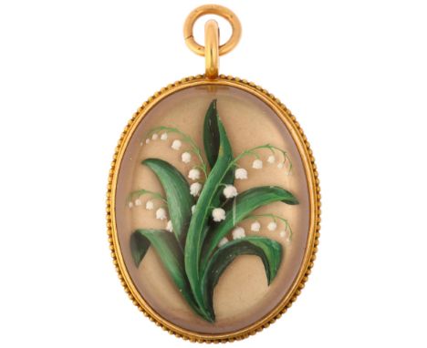 A late Victorian Essex Crystal 'lily of the valley' locket pendant, circa 1880, the oval high cabochon reverse carved intagli