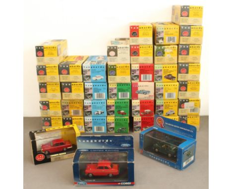 A large collection of Vanguards 1/43 scale diecast models - all in the original boxes, mostly cars but also a few light comme