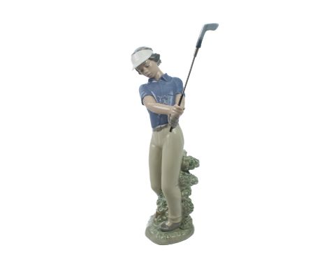 A Nao porcelain figure of a female golfer, 'Fore!' - model no. 0451, brown printed factory mark, with separate club, 28.5cm h