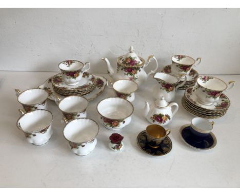 A Royal Albert &lsquo;Old Country Roses&rsquo; part tea service &ndash; comprising a teapot, sugar bowl, cream jug, eight cup