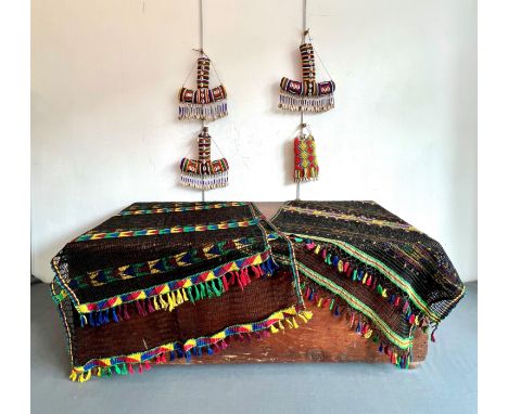 Four Nigerian Yoruba bead and shell decorated flasks - 20th century, three T-shaped in stuffed fabric, decorated with polychr
