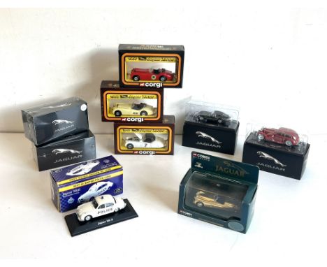 Nine diecast model Jaguar cars by Corgi and Atlas Editions - including three Corgi Cars of the 50's Jaguar XK120 Roadsters; a