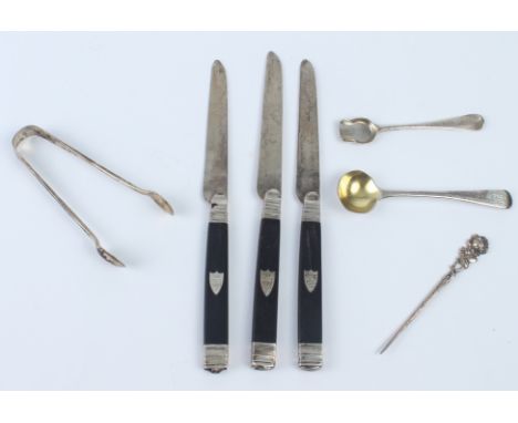 A small group of silver - comprising a set of three 19th century French silver horn-handled fruit knives; a George III mustar