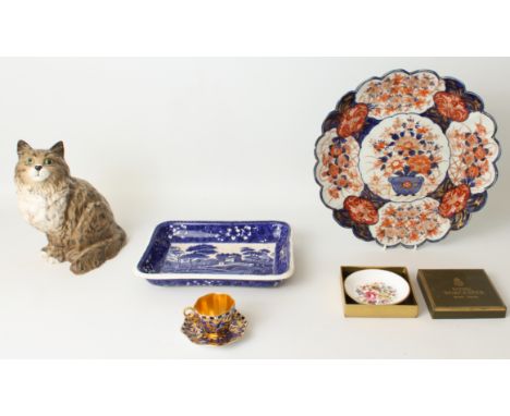 A mixed lot of five: 1. a Beswick 1867 seated Persian cat (20.5 cm high); 2. a miniature Coalport teacup and saucer (4.5 cm h