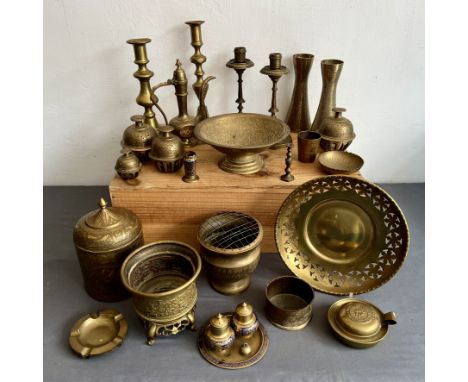 A collection of brass ware, including some Indian and Middle Eastern pieces - to include a pair of Indian brass vases chased 