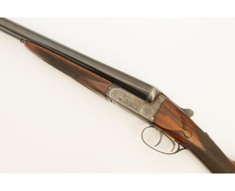 A Churchill 'Regal XXV' best boxlock ejector - 25" chopper-lump barrels, the tubes engraved 'Churchill (Gunmakers) Ltd.' and 