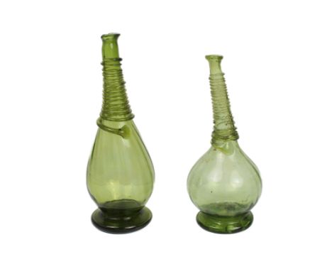 Two Persian blown green glass rose water sprinklers - probably 18th century, both with slight wrythen moulding to the body an