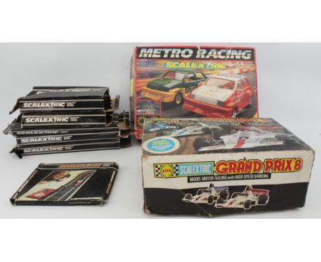 Two 1970s-80s boxed Scalextric sets - comprising a 1970s Grand Prix 8 set (appears complete but black car lacks rear wing); a