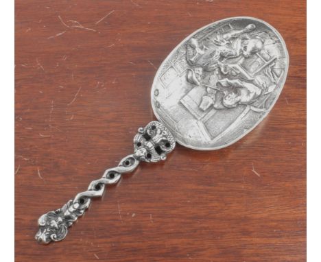 A Dutch silver caddy spoon - Dutch assay marks and London import marks for Adolph Barsach Davis, 1930, the large ovoid bowl c