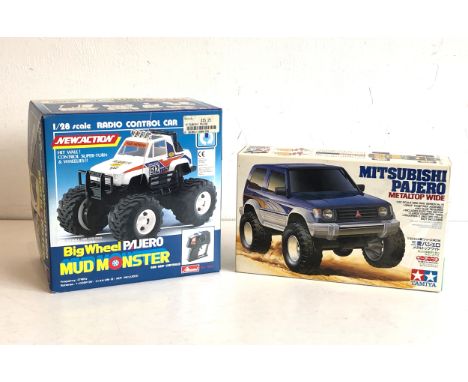 A vintage Tamiya 1/32 Scale Mini 4WD Series No.14 Mitsubishi Pajero Metaltop Wide model kit - snap together, with motor (boxe
