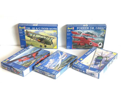 Five Revell scale model aircraft kits - comprising a 1/28 scale 04744 Fokker DR.I Manfred von Richthofen; a 1/32 04712 DH-82 