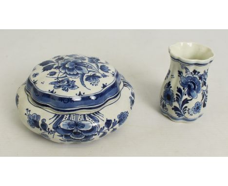 Two small pieces of Delftware: 1. a circa 1900 lidded bowl with hand-painted floral pattern, 'Co. 1717 B.W.' blue painted mar