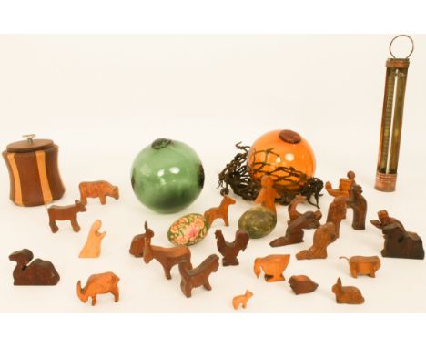 A mixed lot comprising: 1. two glass fishing floats - amber and green; 2. a copper and brass thermometer; 3. two decorative e