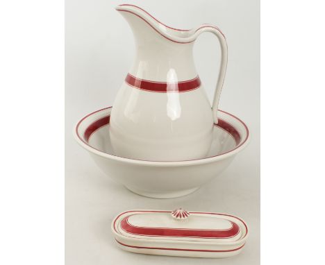 A three-piece wash-basin set -&nbsp; jug, basin and lidded brush-holder, hand-decorated with magenta-rose bands and leaf moti