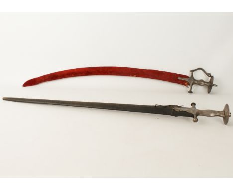 Two tulwar-type swords: 1. 79 cm curved blade of thick and heavy section, the hilt with serpentine handguard, 6.5 cm langet a