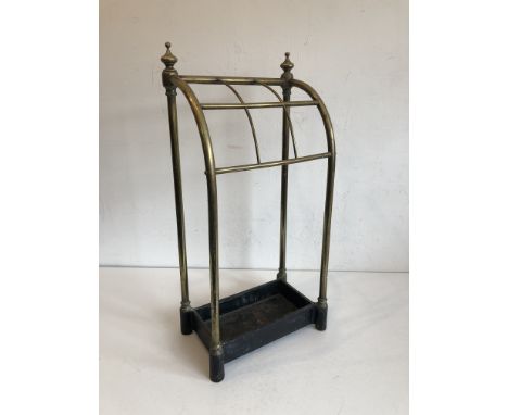 An antique brass and cast iron stick or umbrella stand &ndash; with six divisions. (LWH 30.5 x 17 x 62cm)