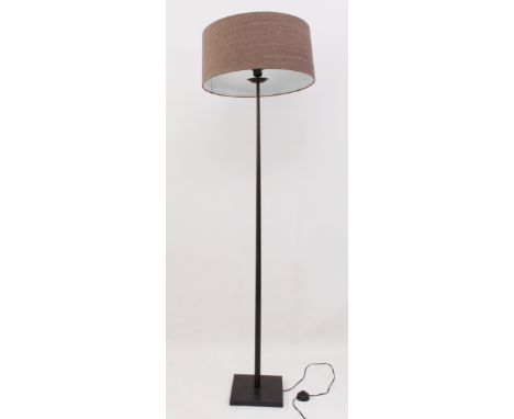 A black-painted metal lamp standard and shade - tapering stem and square platform base, 174 cm high.