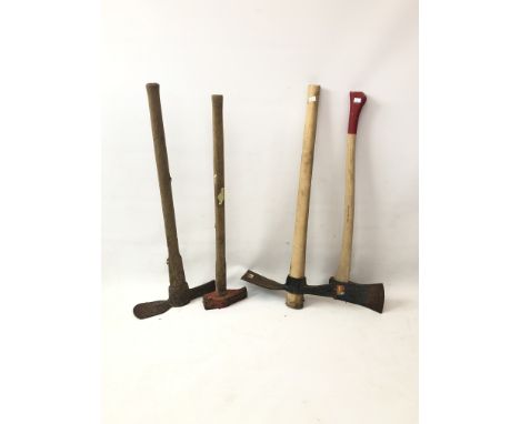 Four heavy hand tools - comprising a 'Trumpeter' axe with US hickory handle; a sledge hammer; and two Mattocks, with beech an